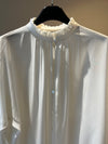 Plisse’ sartoriale blouse